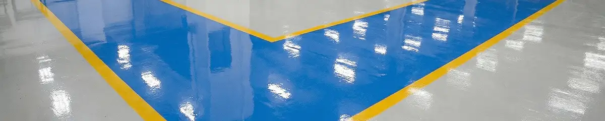 A factory floor professionally covered and marked with epoxy flooring in Ogden, UT