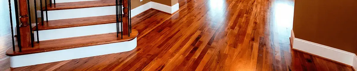 Base floor of a staircase with professionally restored wood flooring in Ogden UT