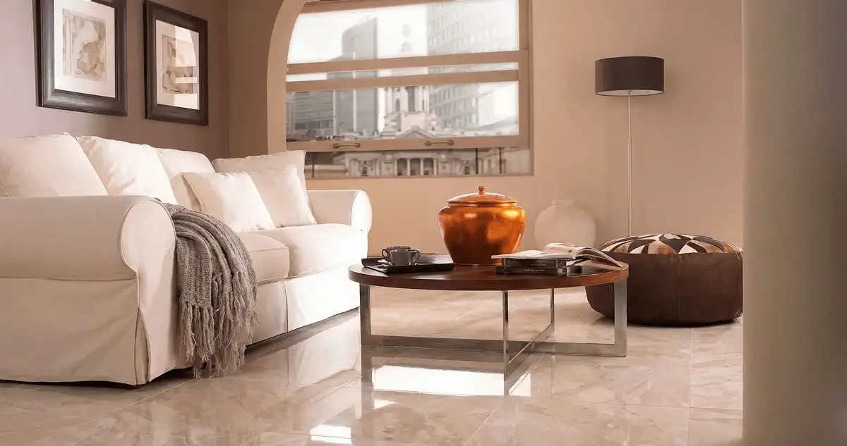 Modern living room with professionally installed marble flooring, a beige sofa, coffee table in Ogden, UT