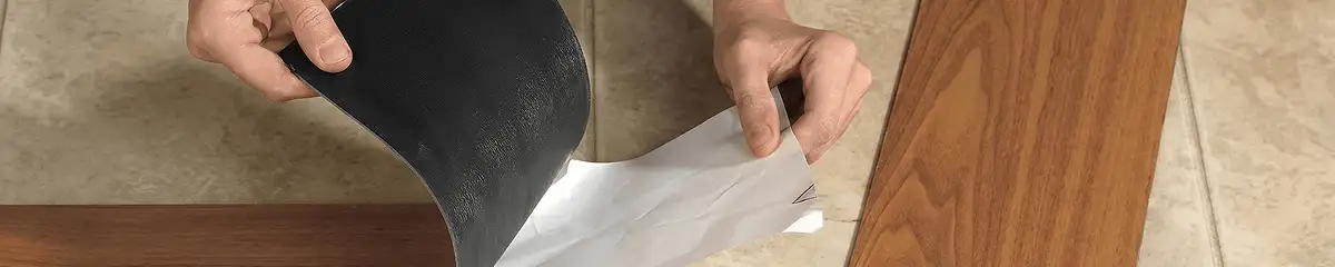 A professional installing vinyl flooring in Ogden, UT