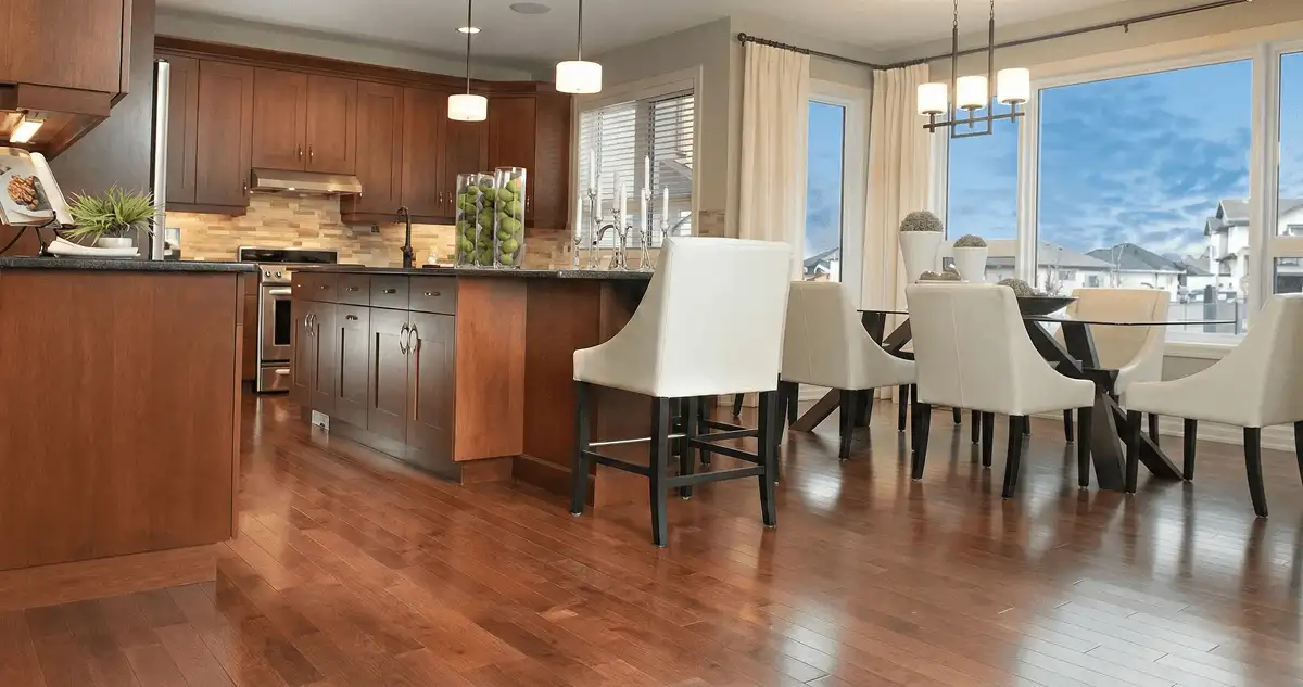 A modern kitchen with professionally installed wood flooring in Ogden, UT